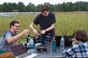 ASU Students make adjustment to ECHO. Left to right: Ben Stinnett, Jacob Burba, Lauren Turner