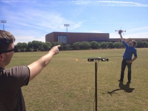 ECHO team members Mason Denny and Marc Leatham perform test on a scale model testbed